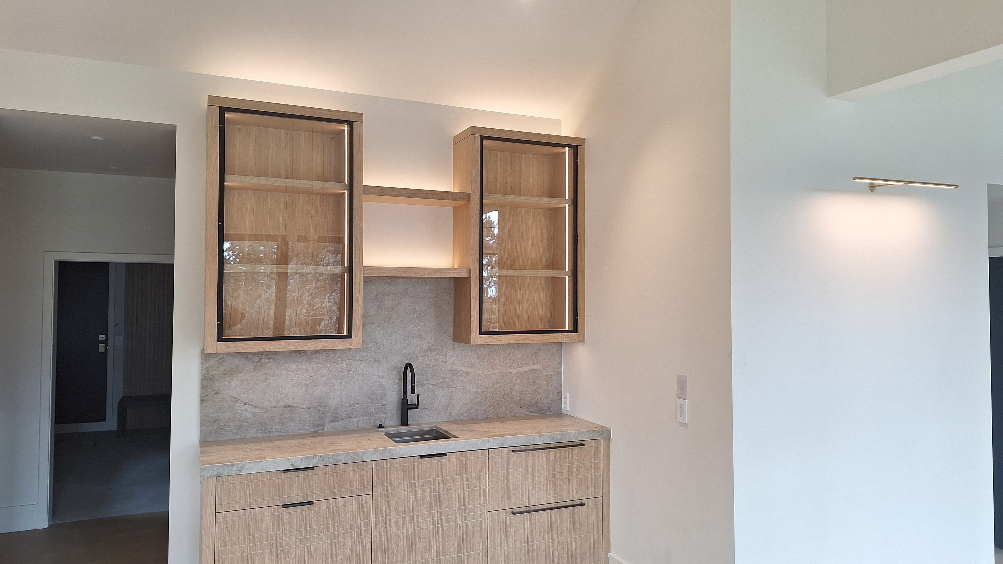 Project Sleek Kitchen and Bathroom Redesign with Elegant Lighting image