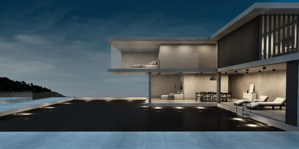 Modern architectural house with infinity pool at twilight, featuring sleek design and outdoor seating.